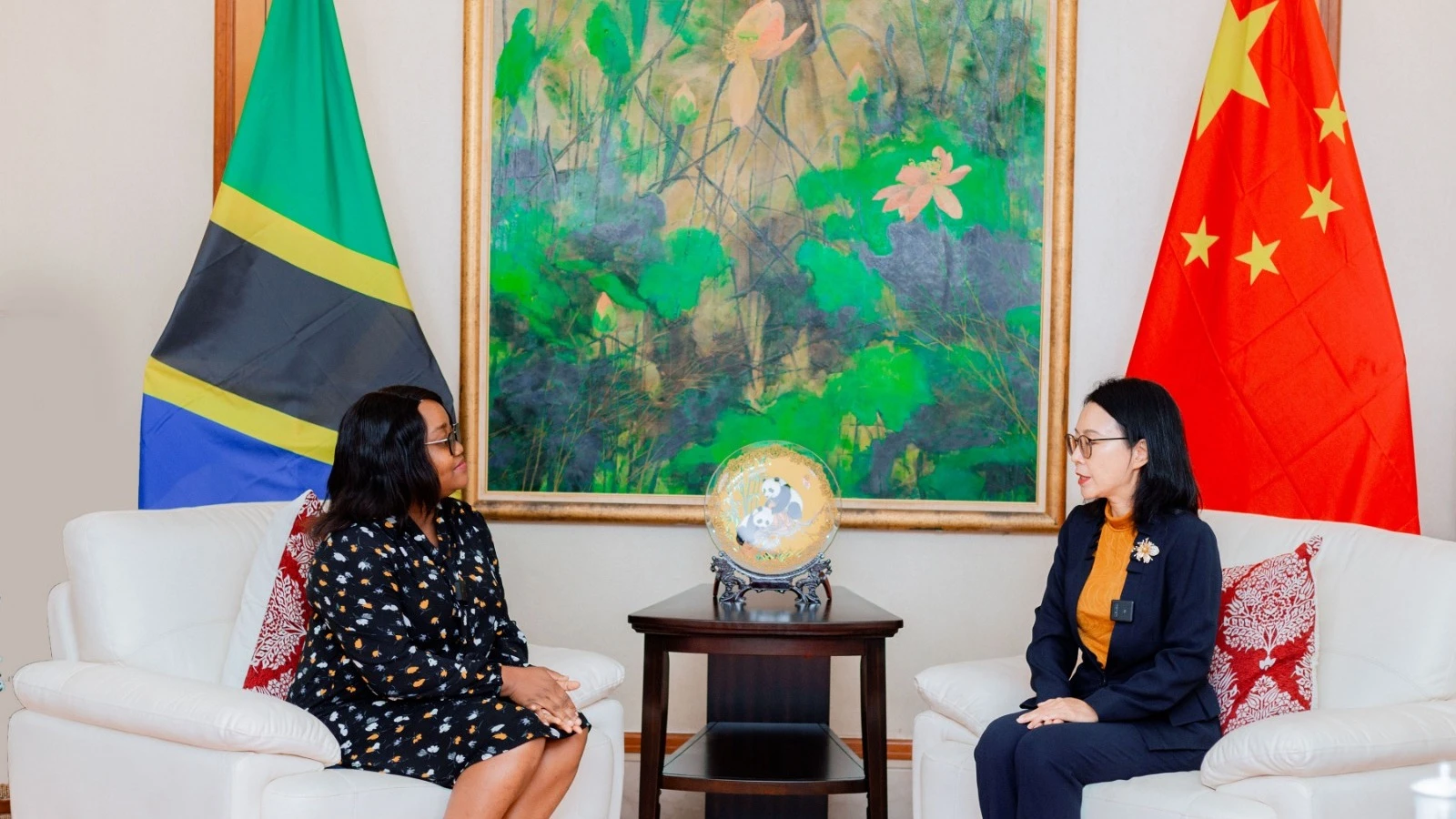 China’s Ambassador to Tanzania, Chen Mingjian (R), holds an exclusive interview with The Guardian’s Mary Kadoke (L) in Dar es Salaam at the weekend. The highlights included insights into the decades of relations between the two countries.