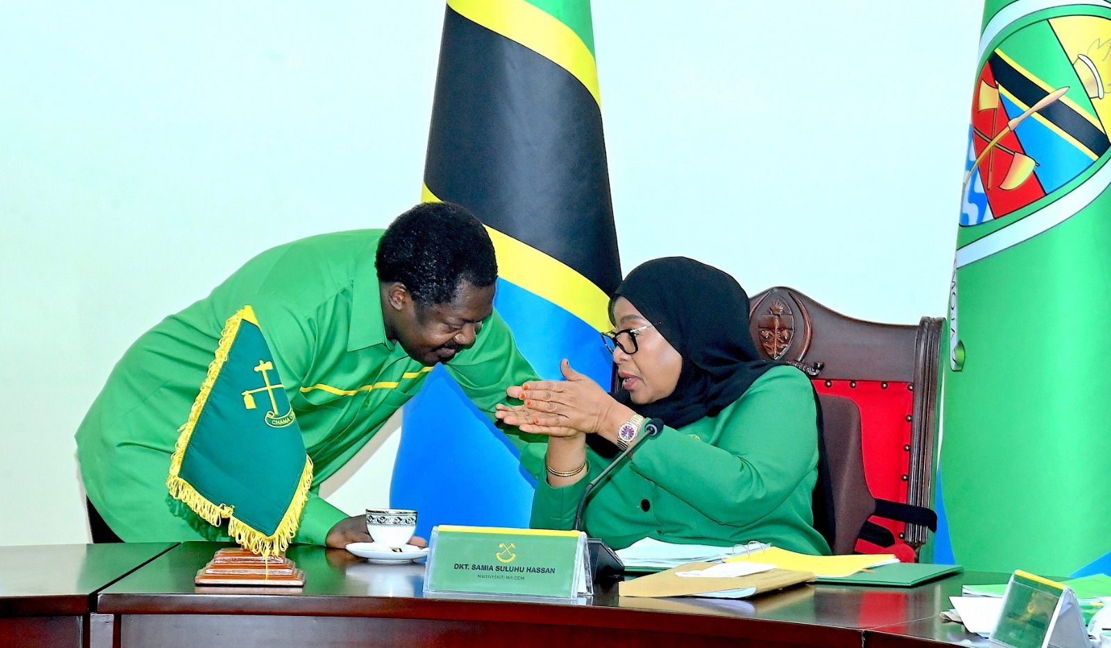  CCM national Chairperson President Samia Suluhu Hassan and Vice President Dr Emmanuel Nchimbi, a member of the party’s National Executive Council, consult yesterday during the second and last day of a meeting of the council’s Central Committee.