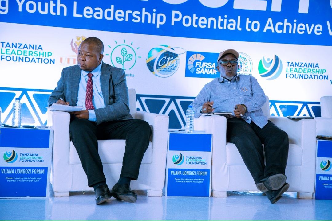 Prof Riziki Shemdoe (L), Minister of State in the Prime Minister’s Office (Regional Administration and Local Governments), follows discussions at a University Youth Conference at Mzumbe University in Morogoro municipality at the weekend.