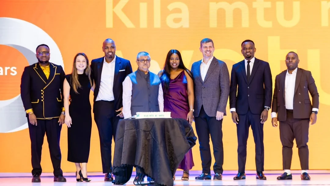 Deputy Country Manager, Credit, at Watu Credit Tanzania, Eddsteve Mwangalimi (left); Head of Finance at Watu Credit Tanzania, Anastasija Matvejeva (second from left); Country Manager at Watu Tanzania, Rumisho Shikonyi (third from left); Board Chairman